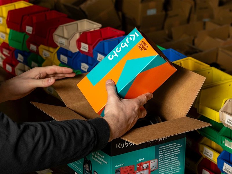 Kubota small parts kit being assembled with organized components for OEM equipment packaging