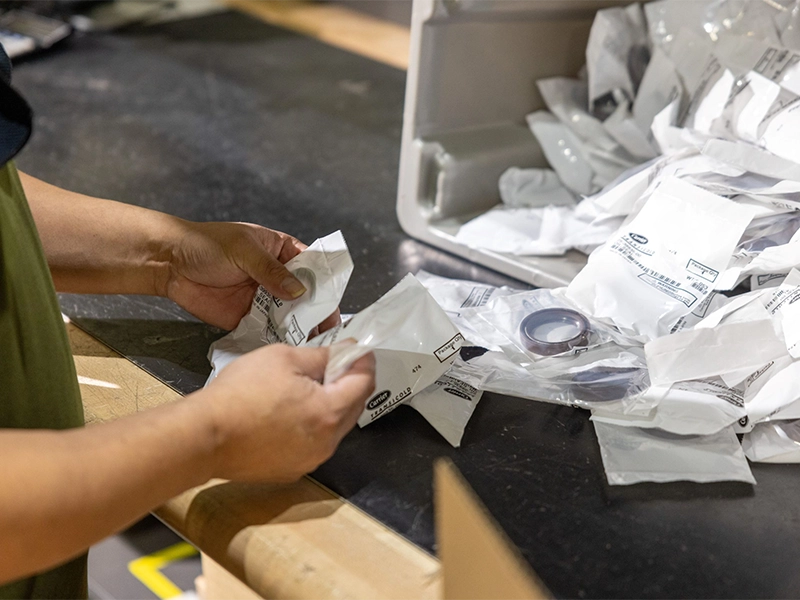 Kubota quality control process with labeled parts packaging and inspection for accurate order fulfillment