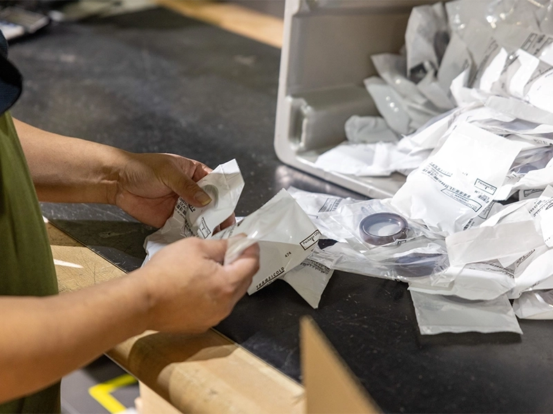Kubota quality control process with labeled parts packaging and inspection for accurate order fulfillment